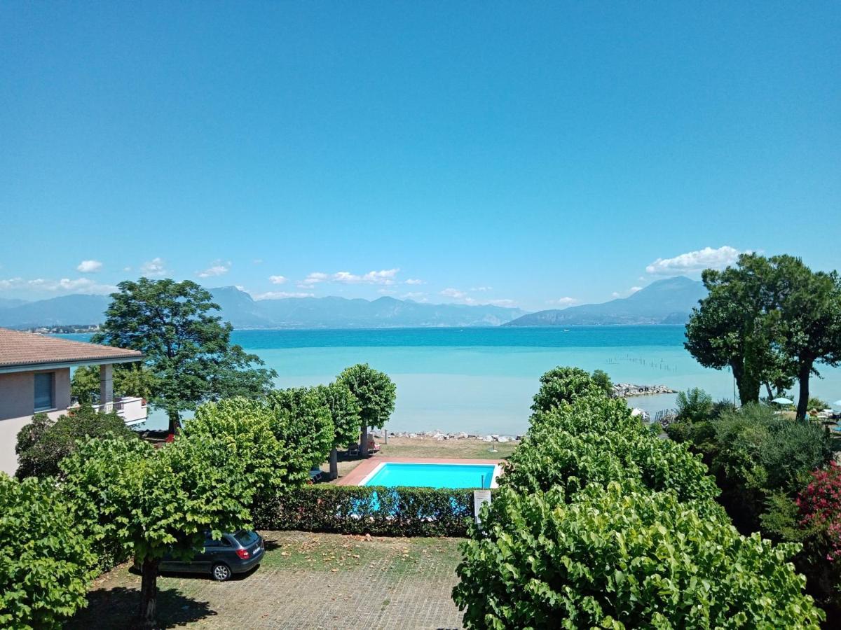 Casa Lugana 19 - Monolocale Con Piscina Direttamente A Lago Sirmione Exterior foto