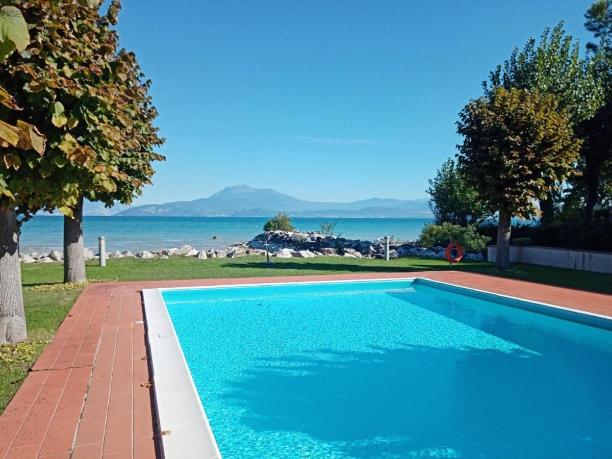 Casa Lugana 19 - Monolocale Con Piscina Direttamente A Lago Sirmione Exterior foto